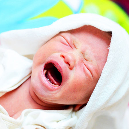 Baby crying because of colic in need of chiropractor in Palo Alto
